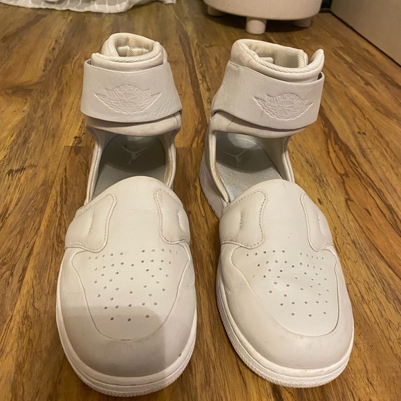 White Nike Air Jordan Hightops with cut out
